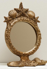 Gold table mirror with shell decoration