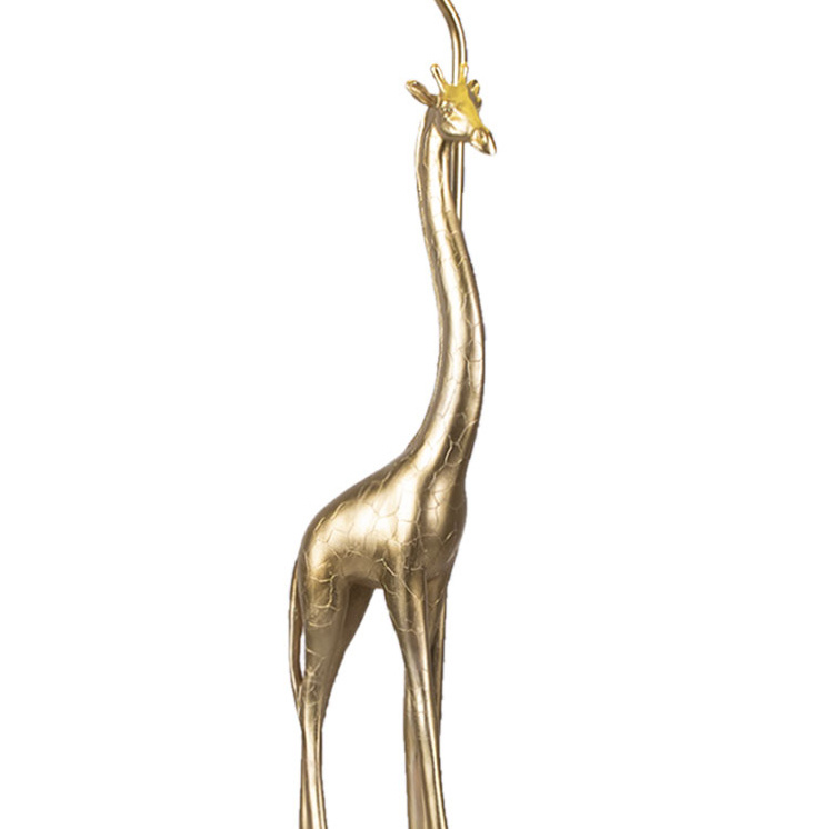 Gouden giraffe tafellamp met linnen kap