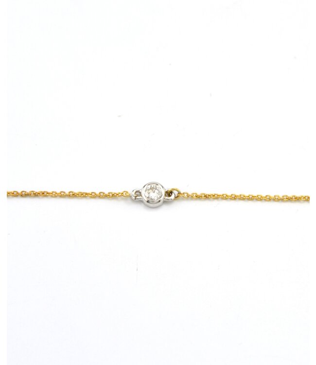 Armband 14 kt bicolor goud met 0.10 karaat