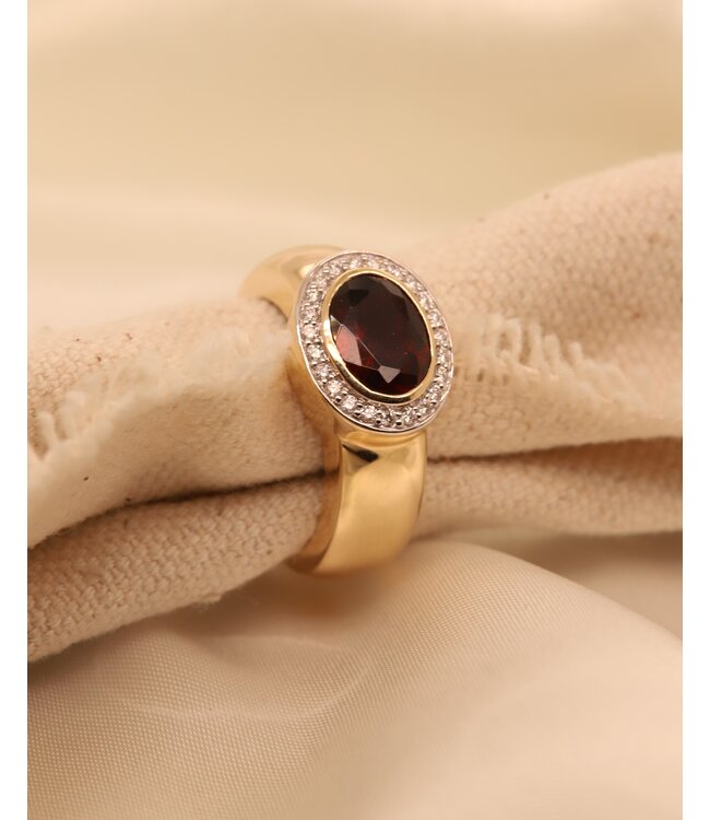 Passione 14K geelgouden ring met diamant 0,16ct en granaat 55