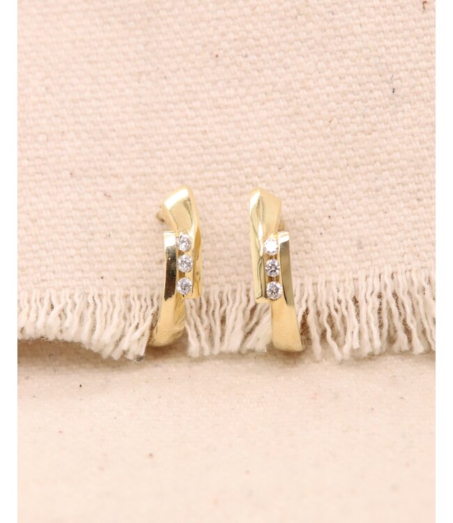 Passione Oorringen geelgoud met diamant 0.15ct
