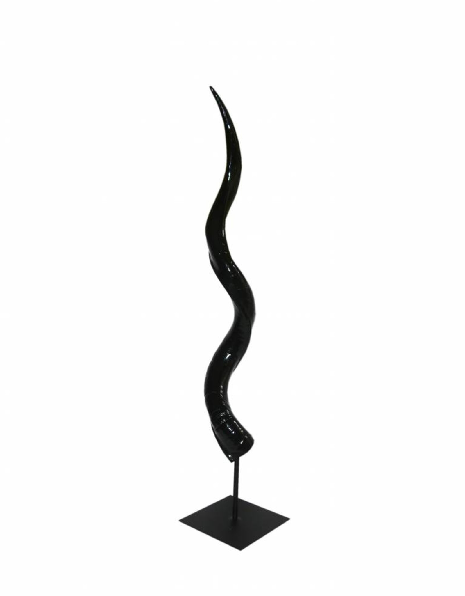 Partially ground black lacquered kudu horn on a metal stand
