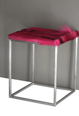 Side table made of pink coloured real springbok fur