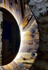 Old wood mirror round with indirect lighting