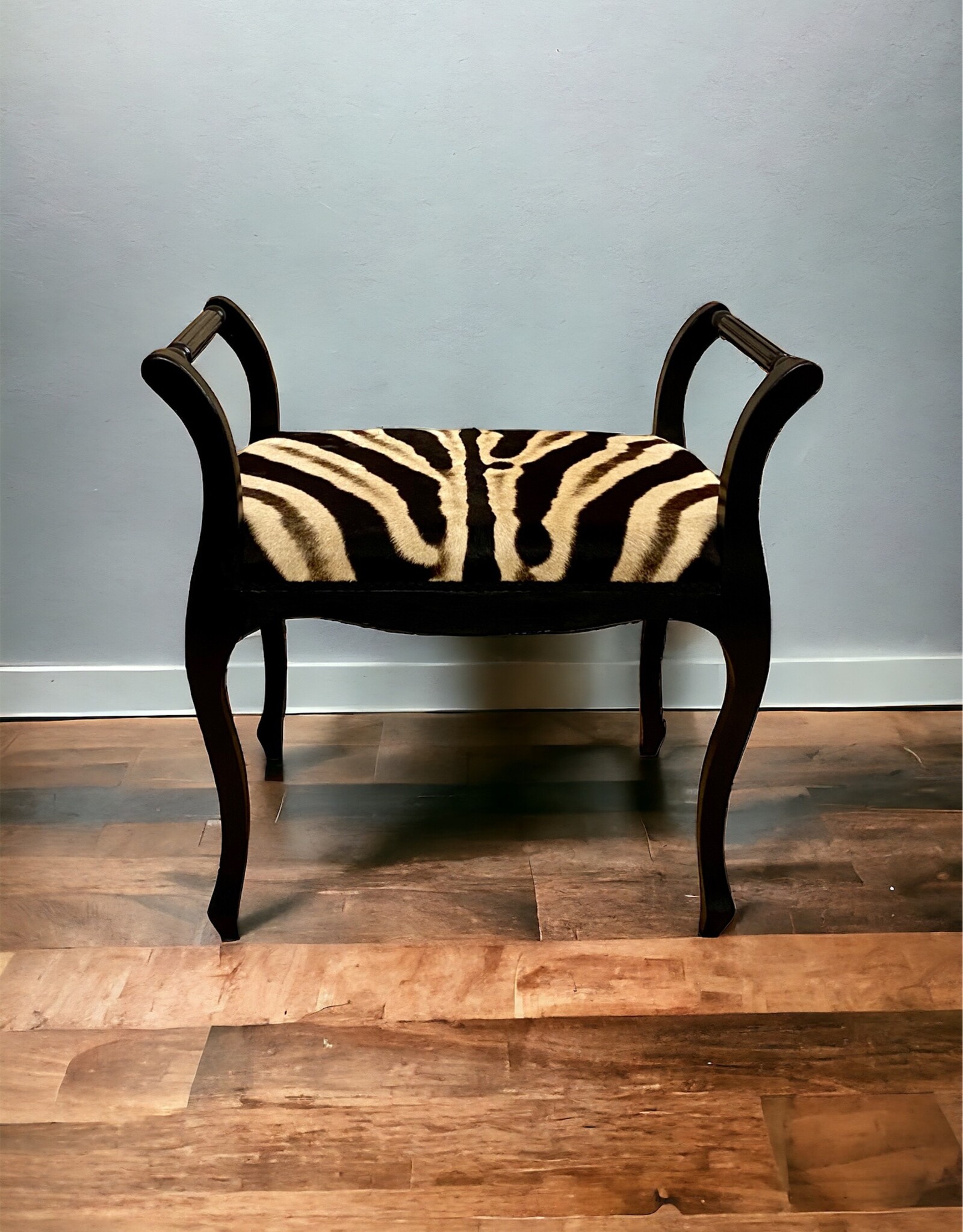 Zebra stool Elegant in Chippendale style made of real zebra hide with armrest