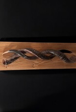 Sculpture made of natural colored kudu horns partially sanded on flamed wood Natural. Harmonious. Timeless.