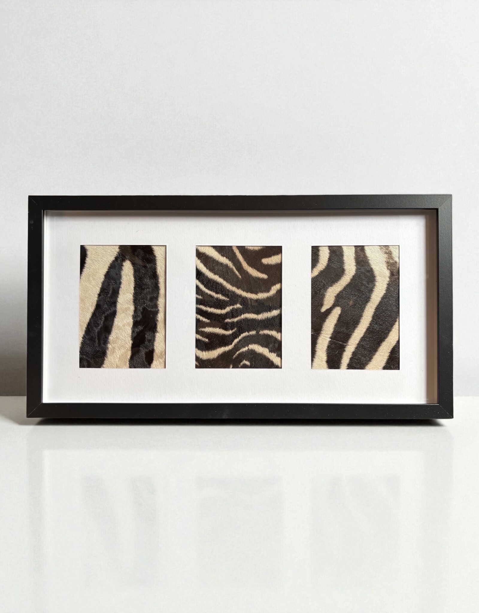 Schwarzer 3er Bilderrahmen mit echtem Zebrafell – stilvoll & einzigartig 57cm x 30cm