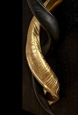 Design Object with Kudu Horns – Black & Gold on Burnt Wood, with LED Lighting This exceptional wall piece is a play of contrast and harmony.