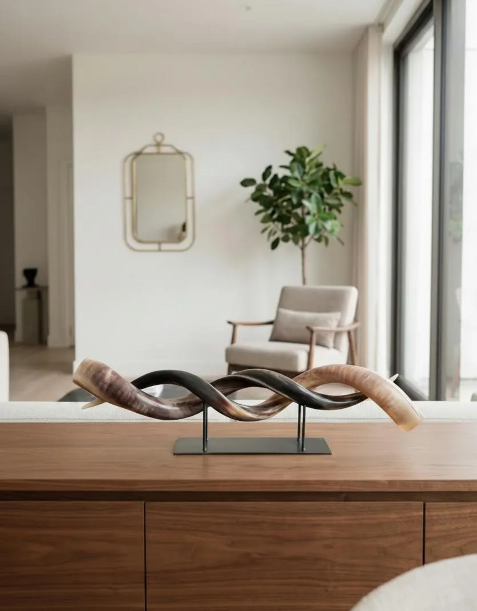 Kudu horn partly ground double on metal stand  - Copy