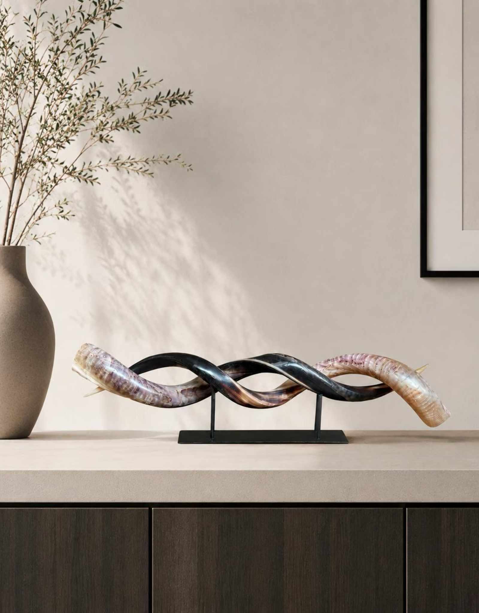 Kudu horn partly ground double on metal stand  - Copy