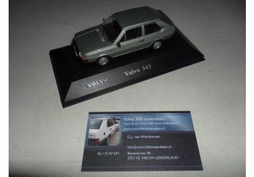 Scale model (2) new Volvo 343 