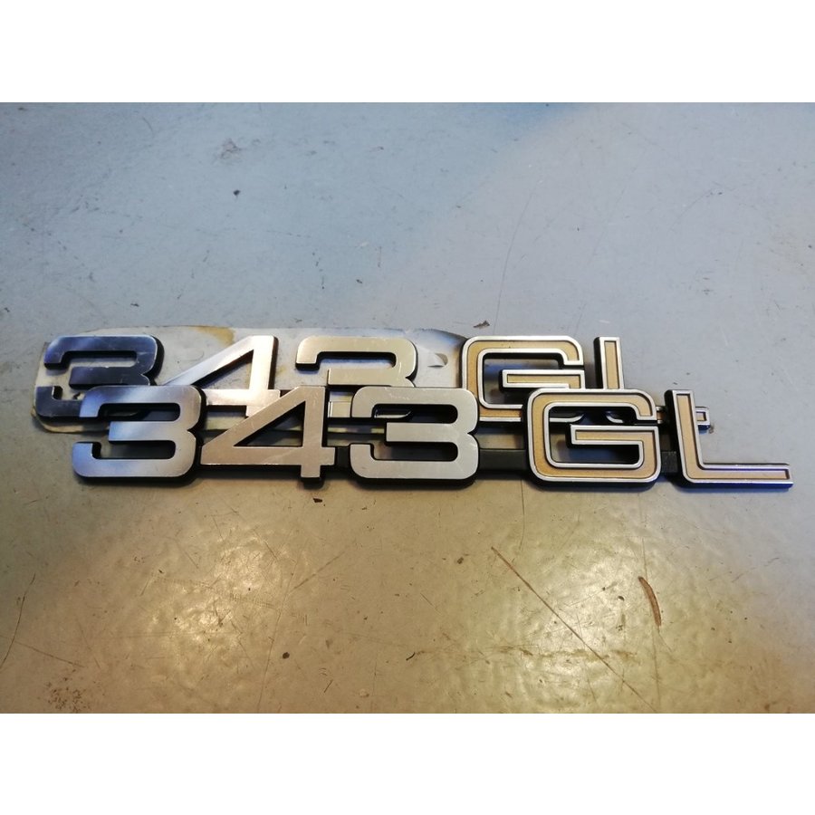 Lettering emblem on the rear of the trunk '343GL' 3282078-9 NOS Volvo 343