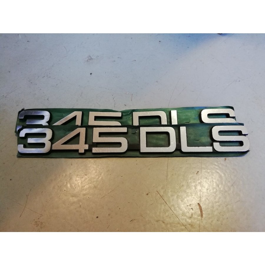 Lettering emblem on the rear of the boot '345DLS' 3282446-8 NOS Volvo 345