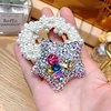 HA195 Pearl Scrunchie with Silver decorated Star