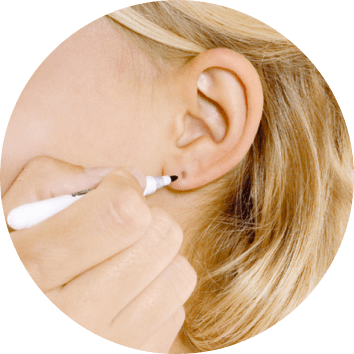 Ontsmetten en aftekenen van het oor