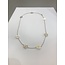 Zilveren ankerketting collier met 7 bloemen