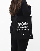 Zwarte katoenen tas met tekst 'Geluk is genieten van wat er is' Zwarte katoenen tas met tekst 'Geluk is genieten van wat er is'