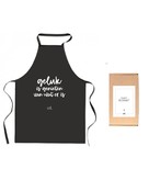 Schort met tekst 'Geluk is genieten van wat er is' in cadeauverpakking