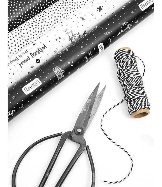 Rol cadeaupapier wit met zwarte dots 50x300cm