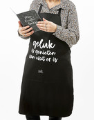 Keukenschort met tekst 'Geluk is genieten van wat er is'