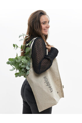 Beige katoenen tas met tekst 'Toedeloe' - van gerycled materiaal