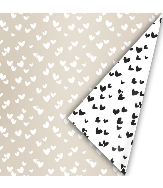 Rol cadeaupapier - zwit met zwarte hartjes 50x300cm
