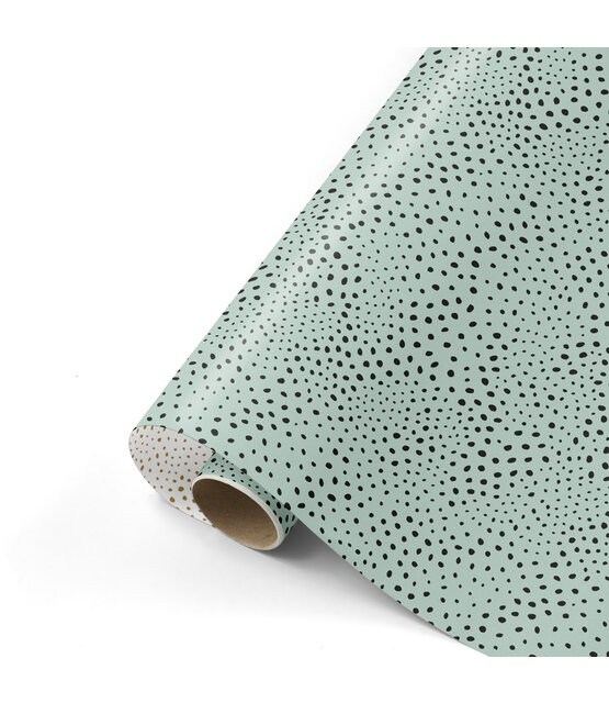 Rol cadeaupapier - groen met zwarte dots 50x300cm