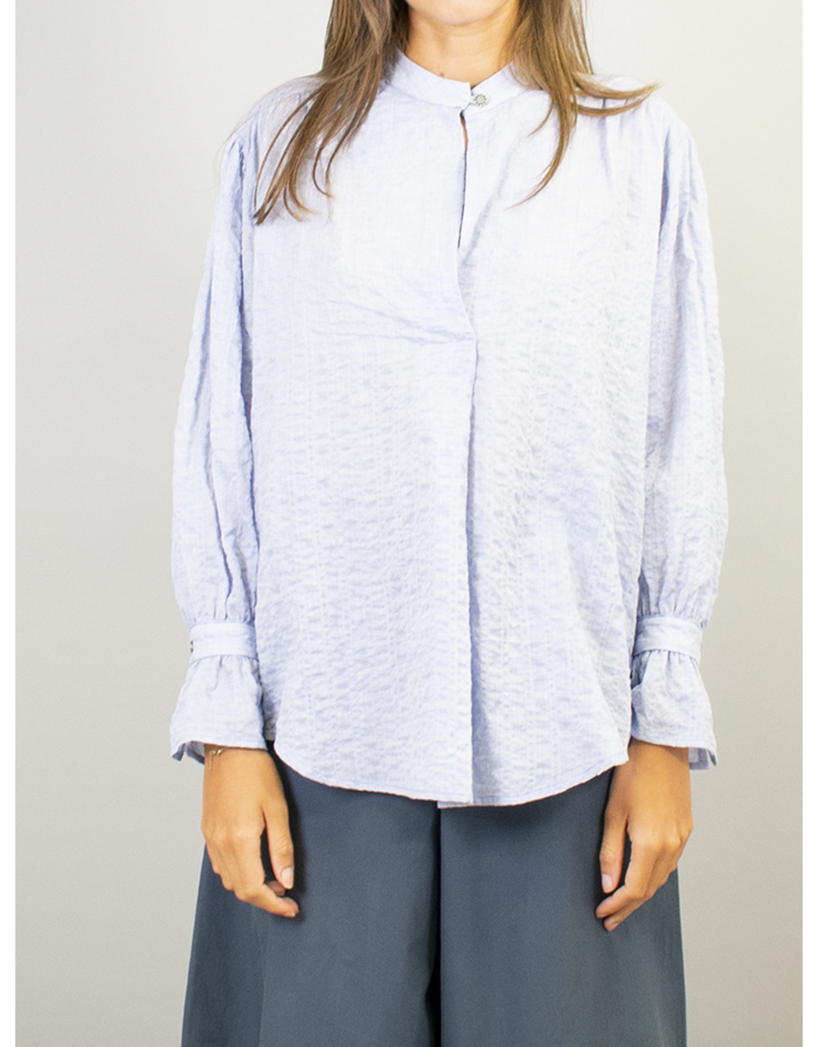 Humility Light Blue Loose Fit Blouse Top with Belted Sleeve Cuff Detail.
