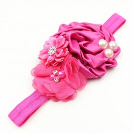 Haarbandje satijnen bloemen parel/strass fuchsia