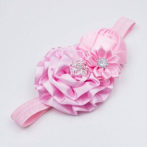 Baby haarbandje met roset/roos/margriet (lichtroze)