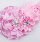 Baby haarbandje met roset/roos/margriet (lichtroze)