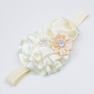 Baby haarbandje met roset/roos/margriet (ivoor)