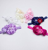 Baby haarbandje met roset/roos/margriet (ivoor)