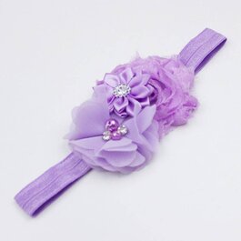 Haarbandje drie bloemen met parels en strass lila