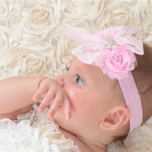 Baby haarbandje kanten strik met strass (lichtroze)