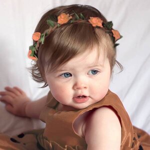 Baby haarbandje hippie guirlande (zalm)