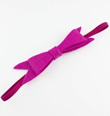 Baby haarbandje met strik van vilt (fuchsia)