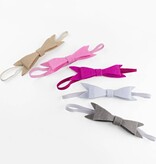 Baby haarbandje met strik van vilt (fuchsia)