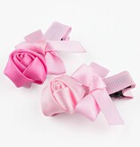 Baby haarspeldje met mini roosje en strik (roze)
