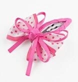 Baby haarspeldje met stippelstrik (roze)