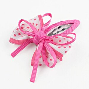 Baby haarspeldje met stippelstrik (roze)