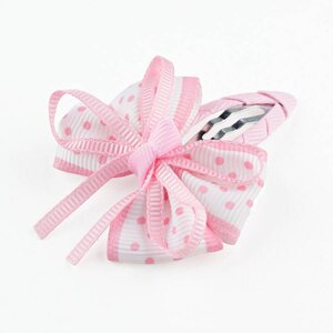 Baby haarspeldje met stippelstrik (lichtroze)