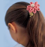 Baby haarelastiekje bloem met bedeltje