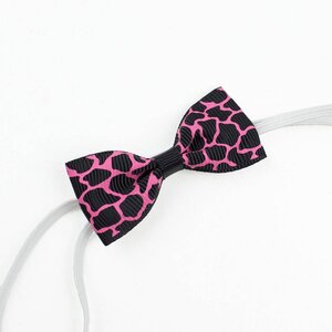 Baby haarbandje met mini strikje (luipaard zwart/fuchsia)