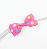 Baby haarbandje met mini strikje (roze stippel)