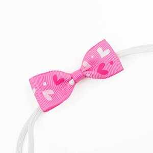 Baby haarbandje met mini strikje (roze hartje)