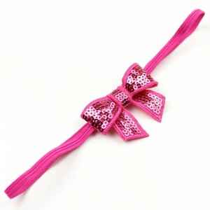 Baby haarbandje kleine strik fuchsia