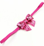 Baby haarbandje kleine strik fuchsia