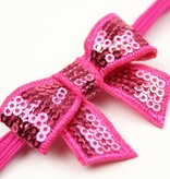 Baby haarbandje kleine strik fuchsia