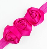 Baby haarbandje met drie satijnen rozen (fuchsia)